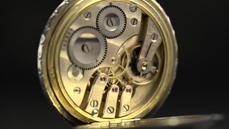 vintage pocket watch mechanism and face