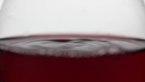 close-up of a glass of red wine