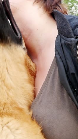 happy woman hugging german shepherd slow motion