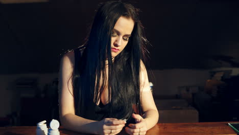 woman woman with headache taking medication, or pills. depressed woman concept taking antidepressant pills.