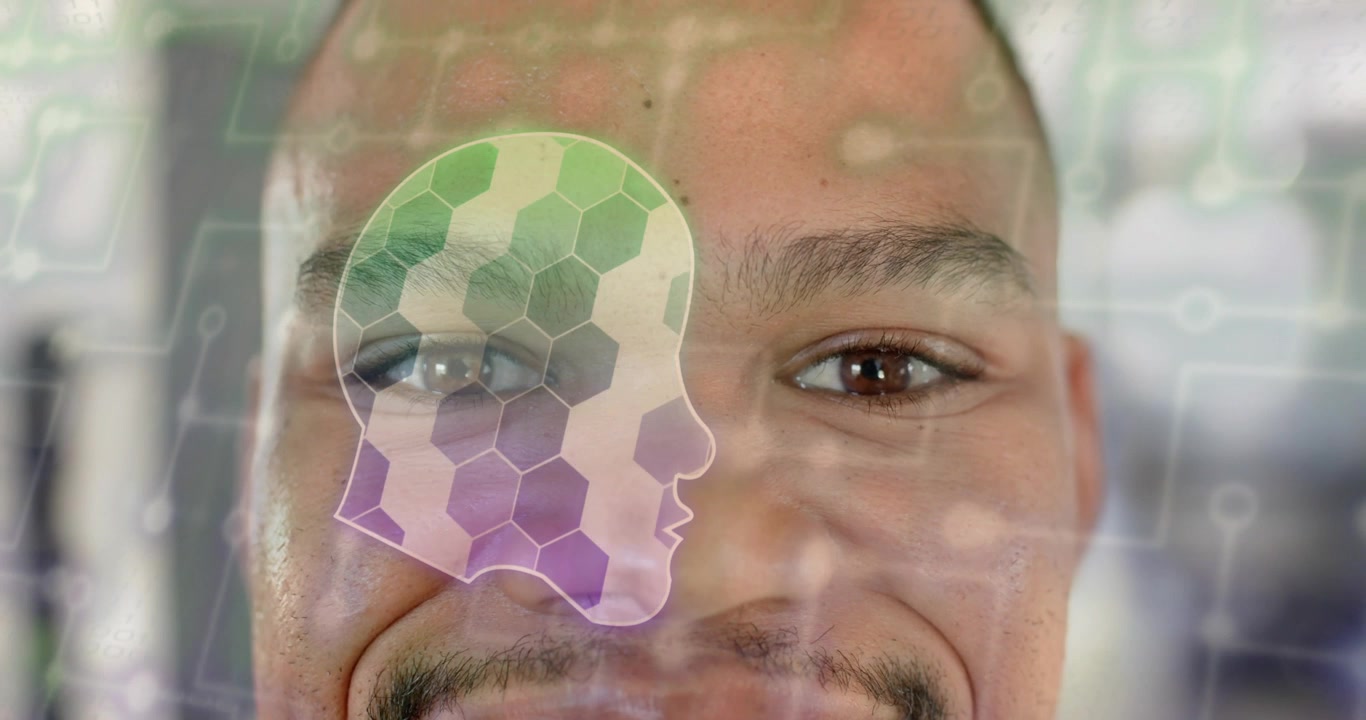 Male subject holding gaze while system projecting hexagon tech overlay for biometric data on cheek