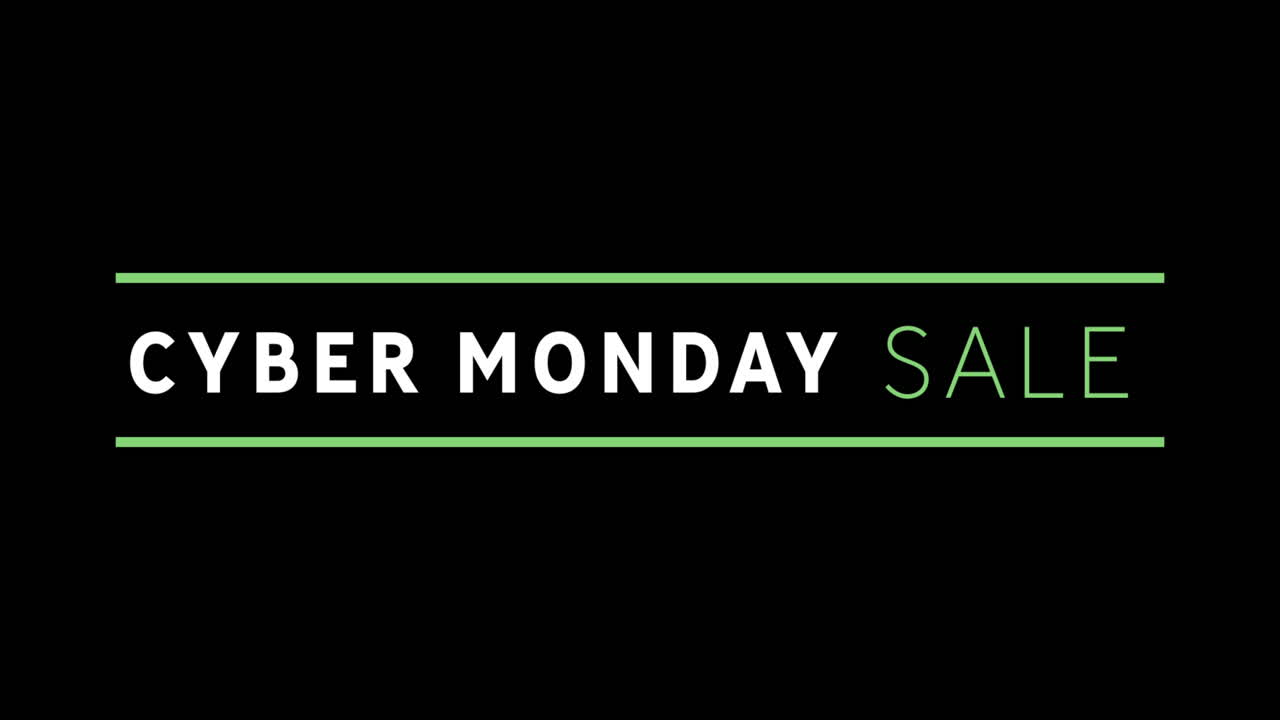 texto de venta blanco y verde de cyber monday que aparece contra una pantalla negra