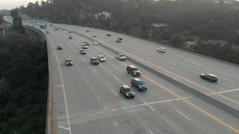 Slow-Motion-Aerial-Slide-of-Cars-on-Ventura-Fwy-in-LA,-California