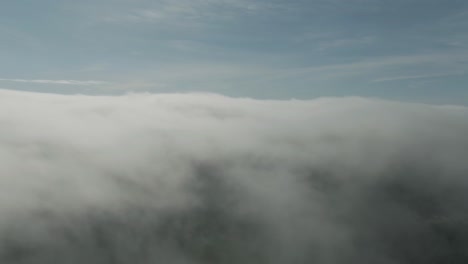 Dramatic-View-Above-The-Clouds-Over-Magdalen-Islands-In-Quebec,-Canada