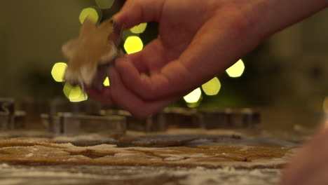 Cutting-gingerbread-dough-with-star-shape-cutting-form
