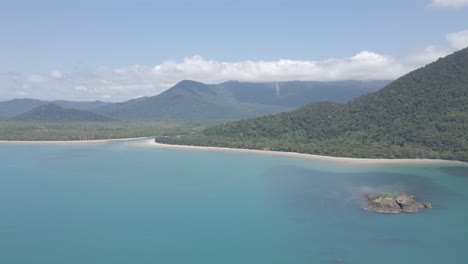 Thornton-Beach,-Estuary-And-Daintree-National-Park---Struck-Island-By-Tranquil-Blue-Ocean-In-Australia