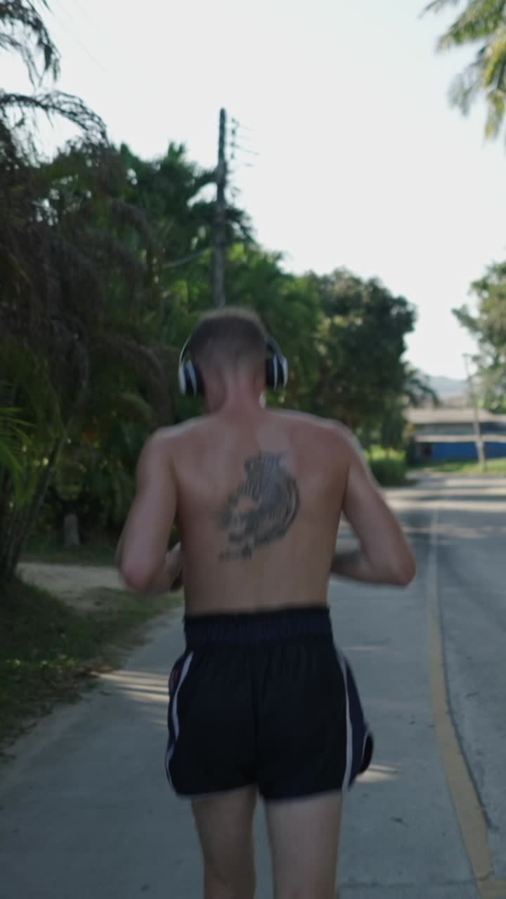Man Running with Headphones