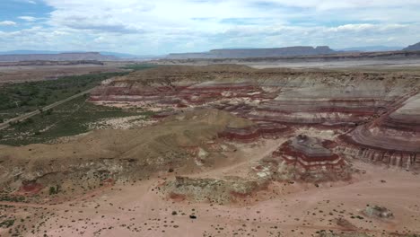 aerial view of bentonite hills near hanksville, utah, usa - drone shot