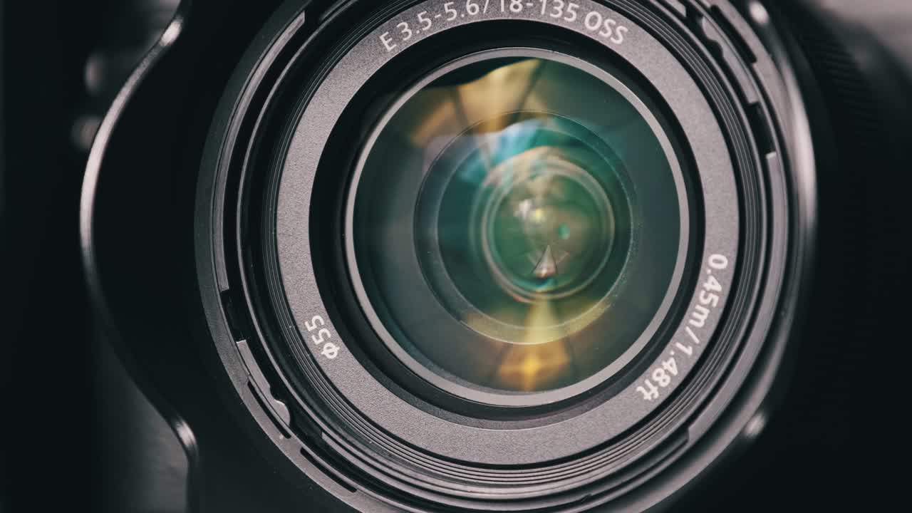 The Camera Lens Rotates, Lights Reflecting Off Glass, Robotic Camera Movement