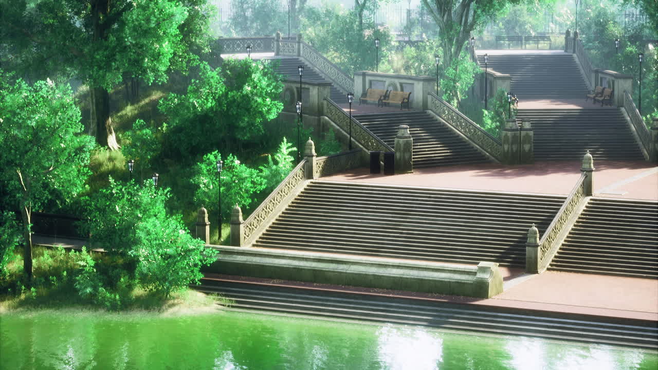 Steps leading to a serene green park by the water in bright daylight