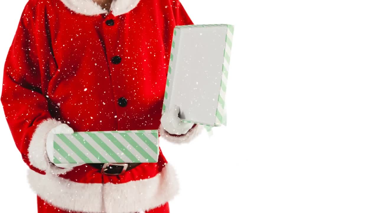 animación de la nieve cayendo sobre santa claus sosteniendo un regalo