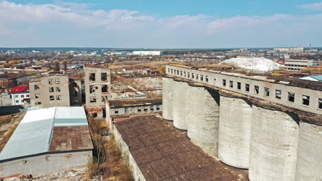 flight over the destroyed factory. old industrial building for demolition. aerial view