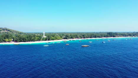 Tropical-island-crystal-clear-water-aerial