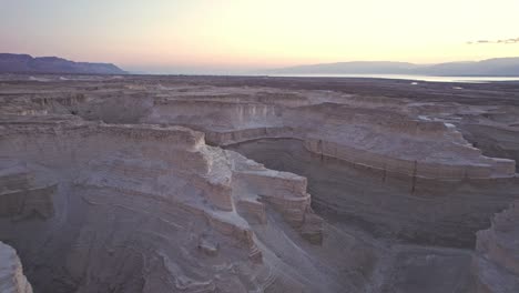 drone shot of masada marl and the dead sea