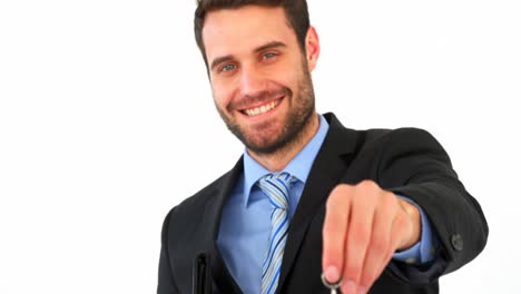 Portrait-of-businessman-holding-keys