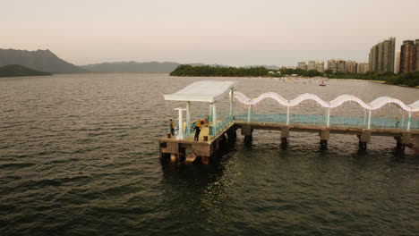 drone view of pier on the waterfront in hong kong city, china