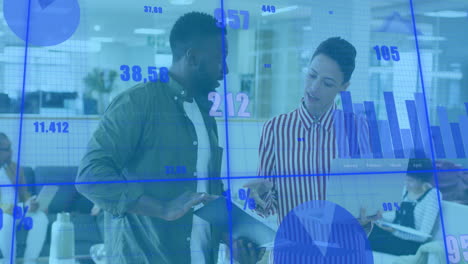 animation of graphs and changing numbers over diverse coworkers standing and discussing reports