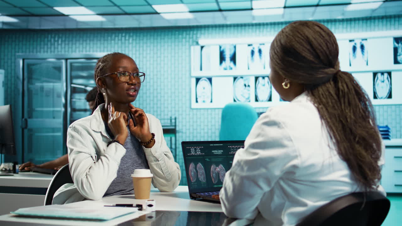 African american girl suffers from a sore throat and bronchial inflammation