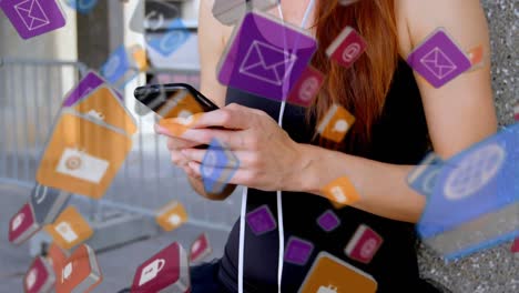 Colourful-cubes-floating-while-woman-uses-smartphone-in-the-background