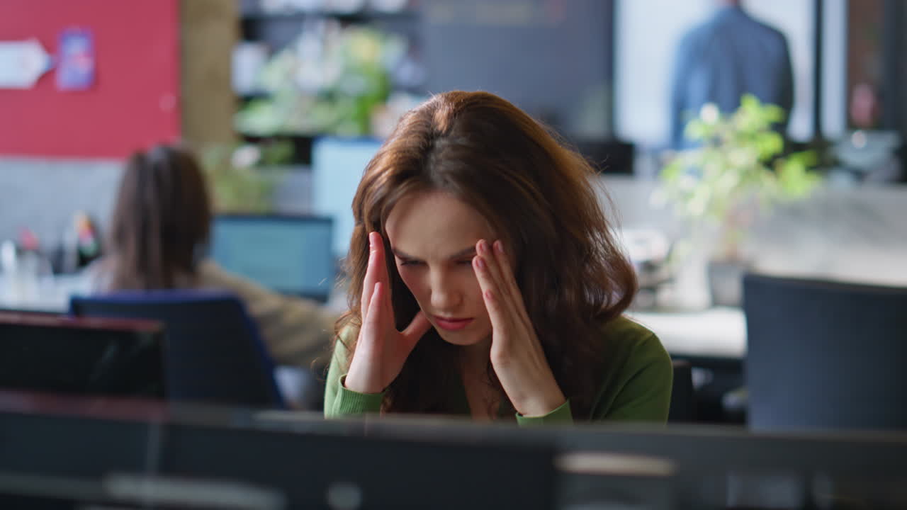 Tired lady looking monitor taking break closeup. Office manager feeling headache