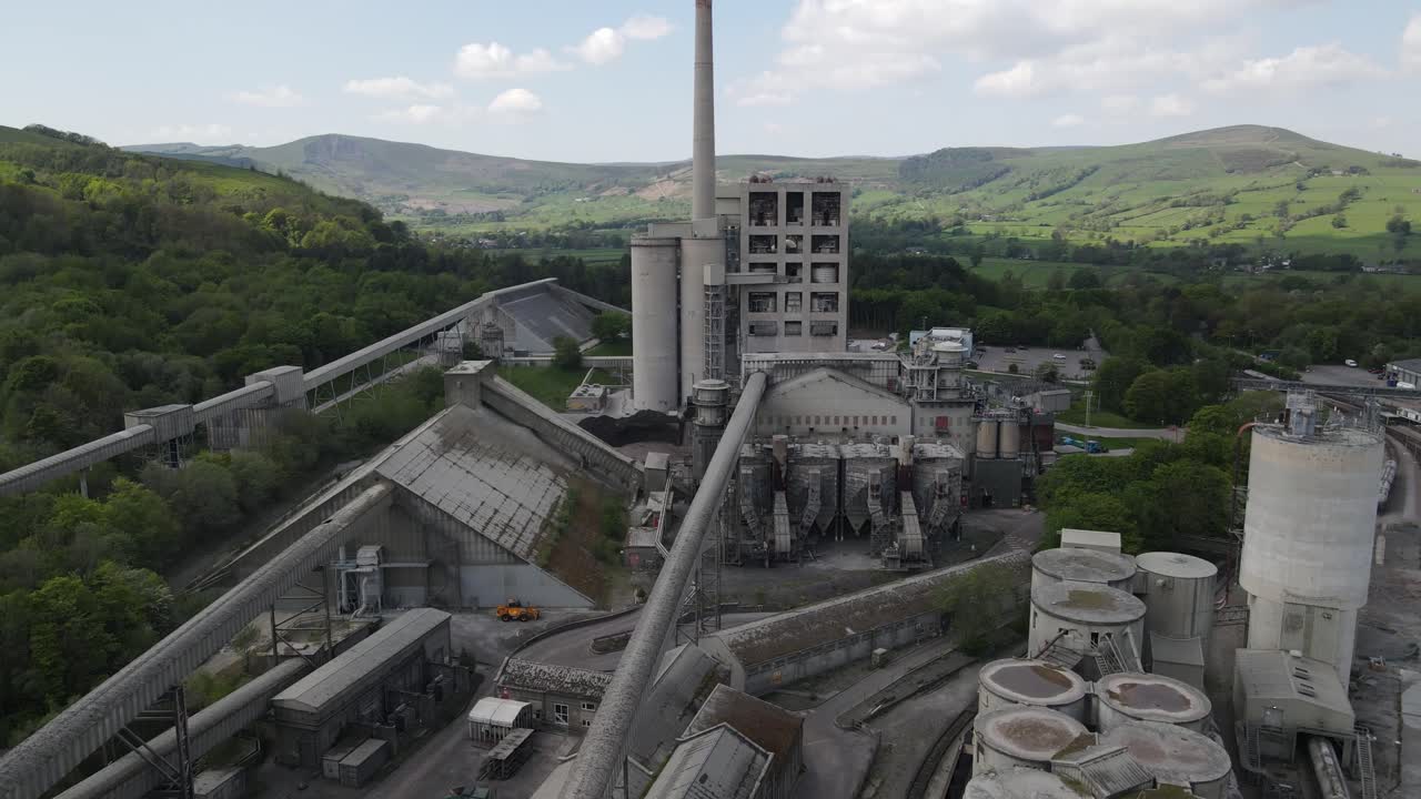 Aerial drone flight over the rooftop of Breedon Hope Cement Works in Derbyshire Peak District National Park