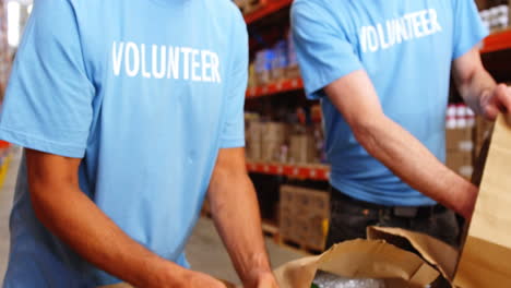 Warehouse-worker-doing-a-charitable-work-