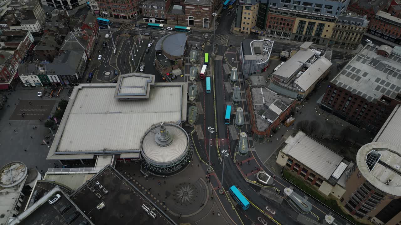 Vibrant urban footage of Liverpool, highlighting the city's dynamic mix of modern development and historic character. The scene captures busy streets. A visual blend of energy and architecture