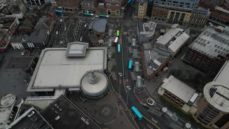 vibrant urban footage of liverpool, highlighting the city's dynamic mix of modern development and historic character. the scene captures busy streets. a visual blend of energy and architecture