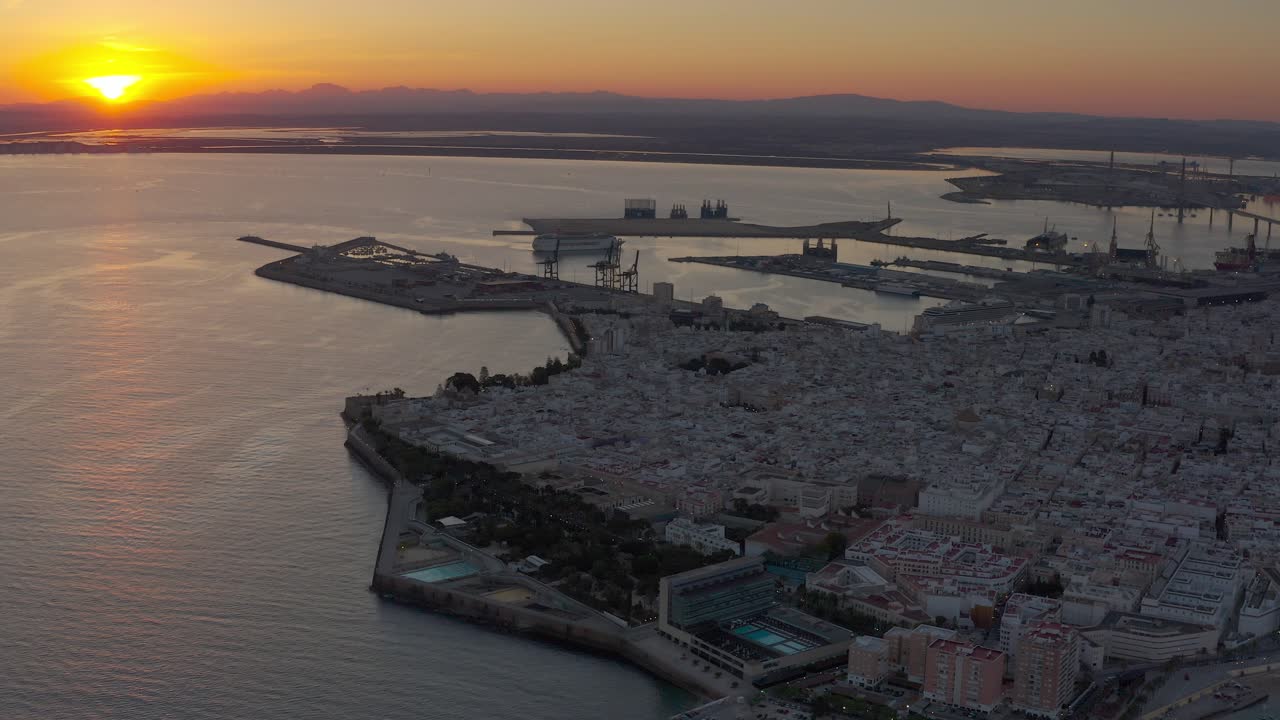 Sunset over the city and port
