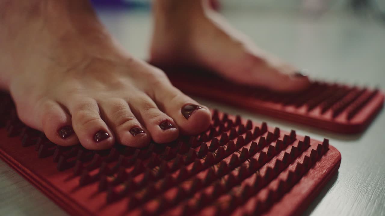 Feet on Reflexology Mat