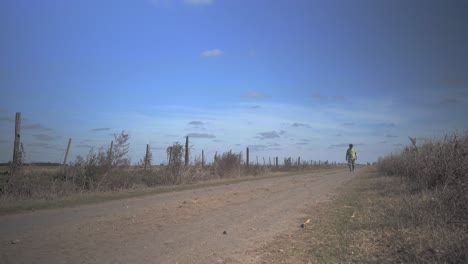 person walking down a rural road