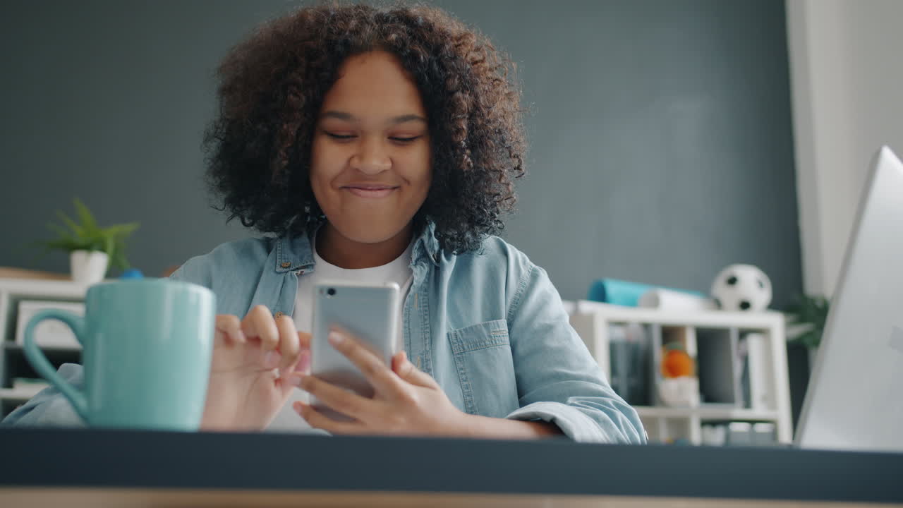 Teenager Using Smartphone