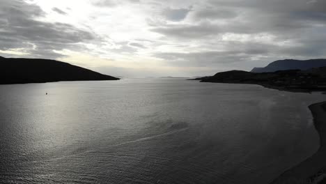 Aerial-backwards-shot-of-Loch-Broom-at-Ullapool-in-the-Scottish-Highlands