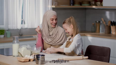 mother and daughter baking together