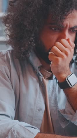 focused student immersed in study while typing at a cozy library desk