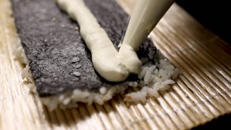 making sushi with cream cheese filling