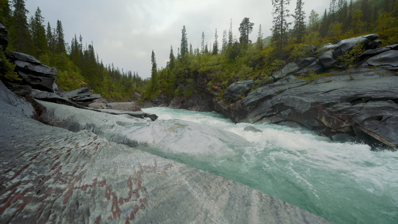 Marmorslottet Marmorfossen river, Mo I Rana, Norway. Nature Cinemagraph. Water carved Marble stone.