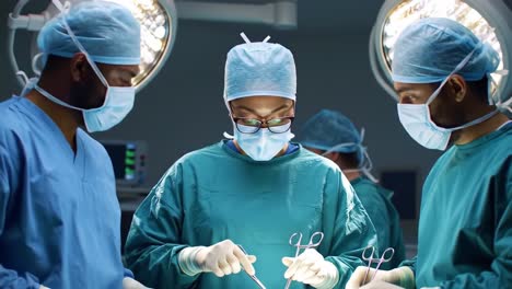 surgeons performing a complex operation in an operating room, showcasing precision and teamwork under bright surgical lights