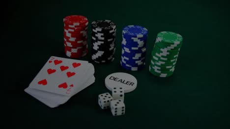 Animation-of-stacks-of-casino-game-chips-and-cards-on-board