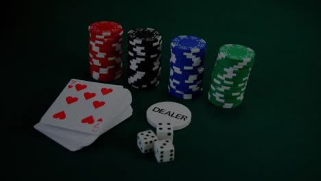 animation of stacks of casino game chips and cards on board