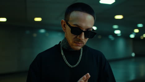 man in urban style with tattoos