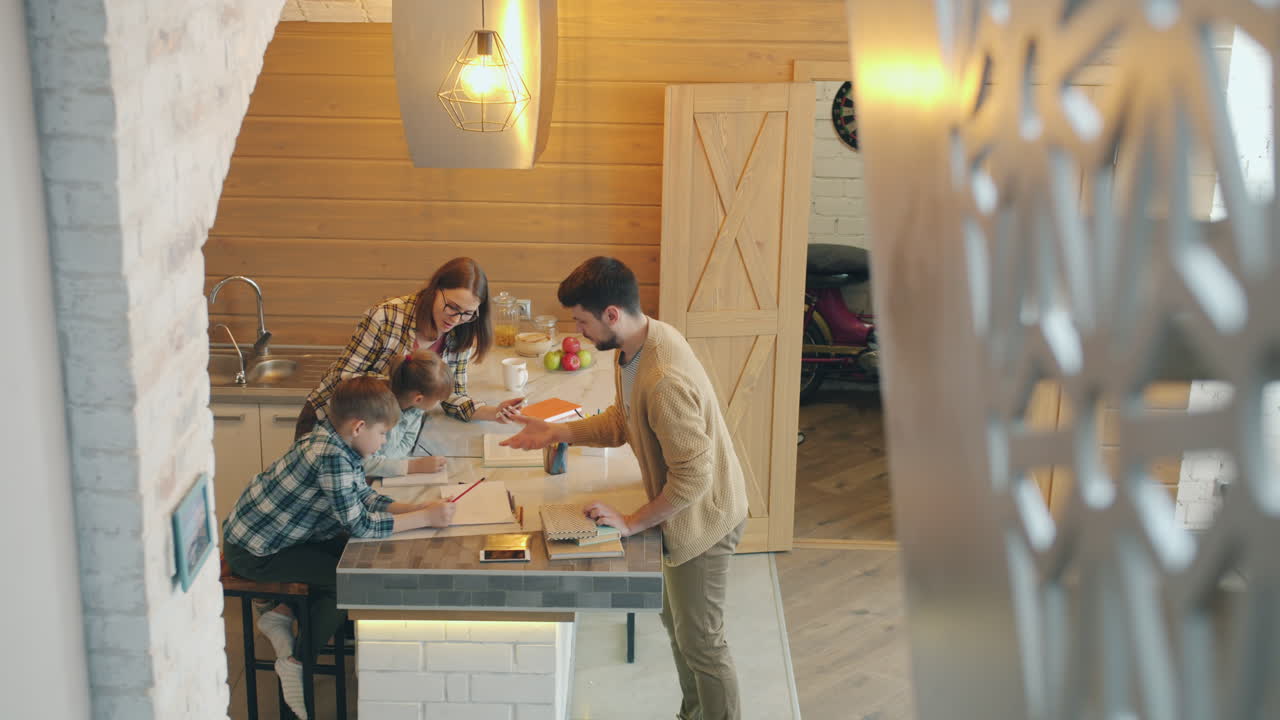 Family Doing Homework Together in the Kitchen