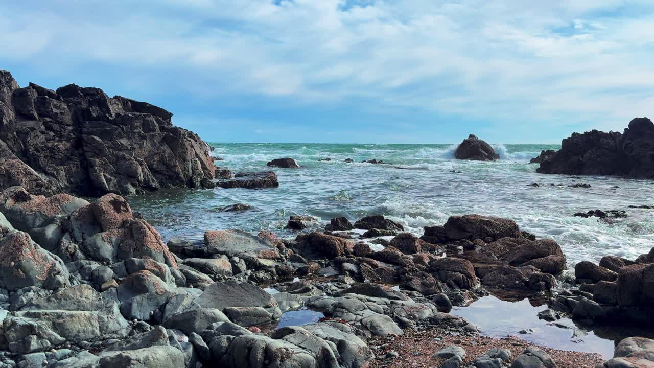 Irish beach south east copper coast Waterford Epic Coast incoming tide on rocky beach