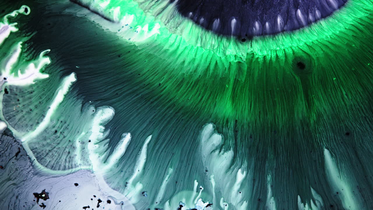 Macro shot of vibrant ink mixing, dynamic and fluid art moment