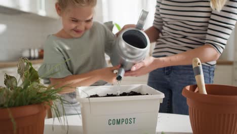 Video-of-cute-little-girl-watering-compost