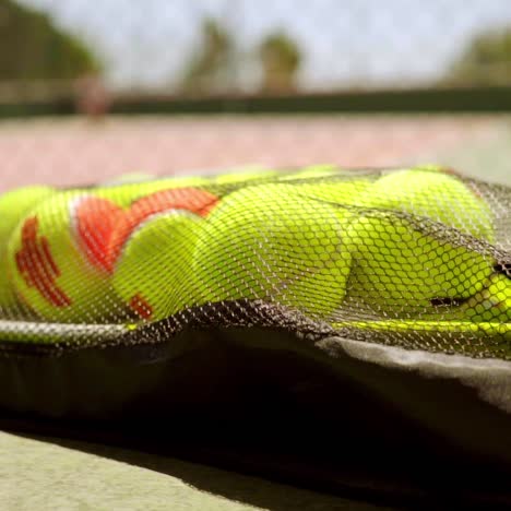 number of tennis balls on a racket for training