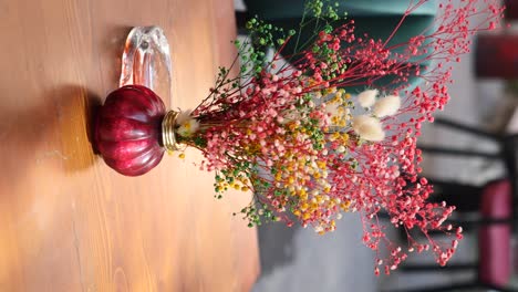 dried flower bouquet on wooden table