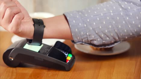 smartwatch payment at cafe