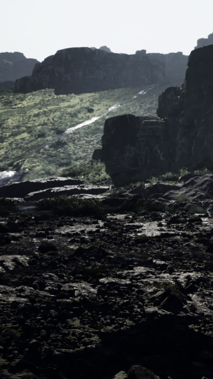 Stunning rocky landscape at dusk with flowing water in a serene setting