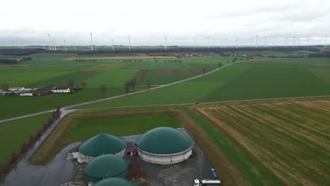 sustainable farming in europe: an aerial view of a biogas plant and farm in germany